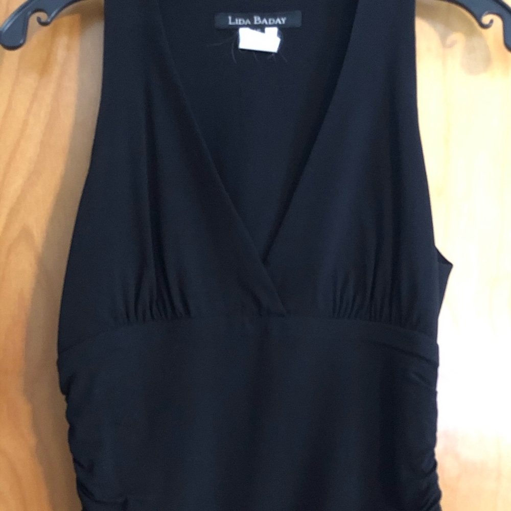 Low cut. Gathered siding with side zipper